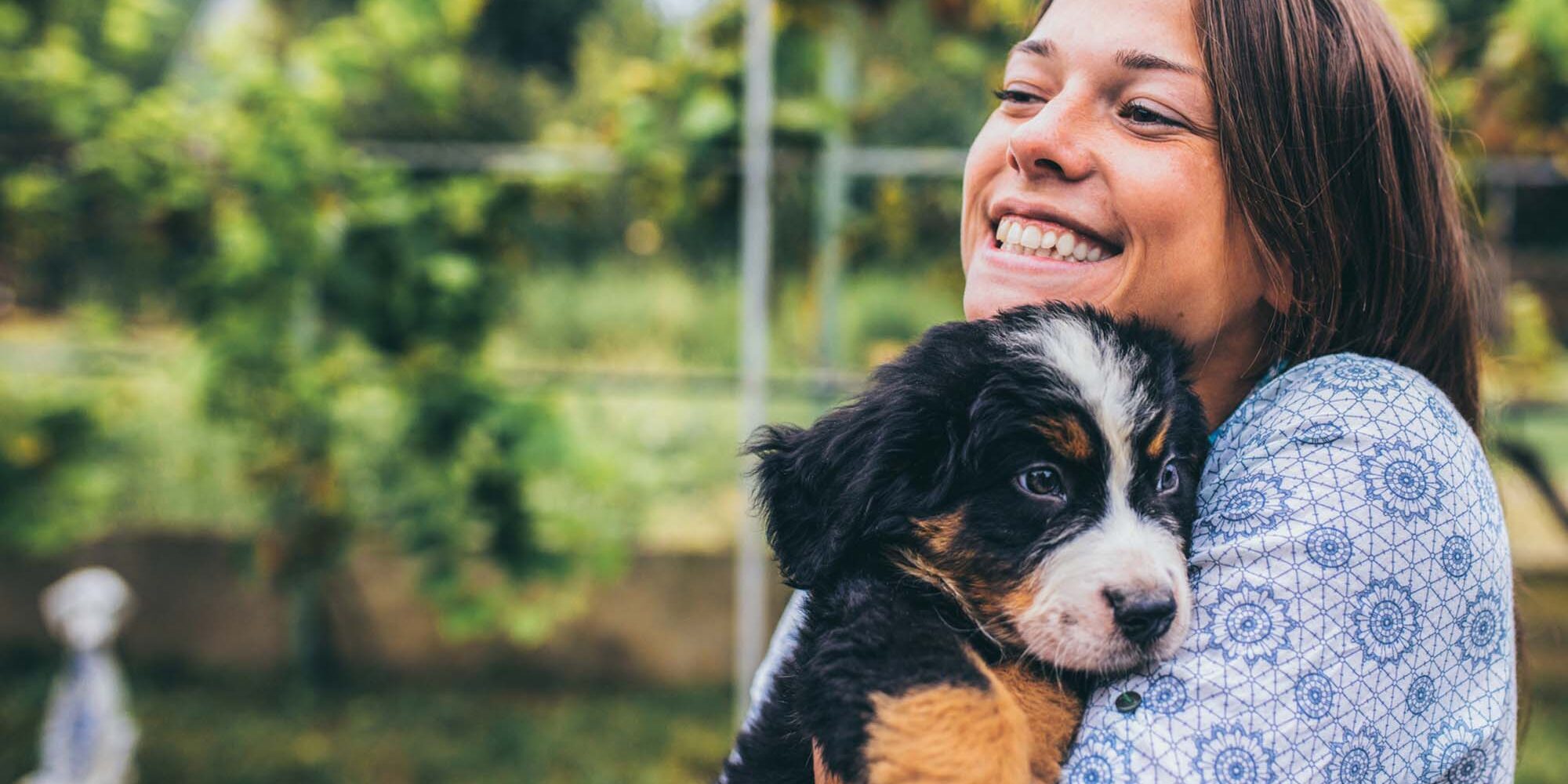 Woman With Puppies Young woman with her puppy